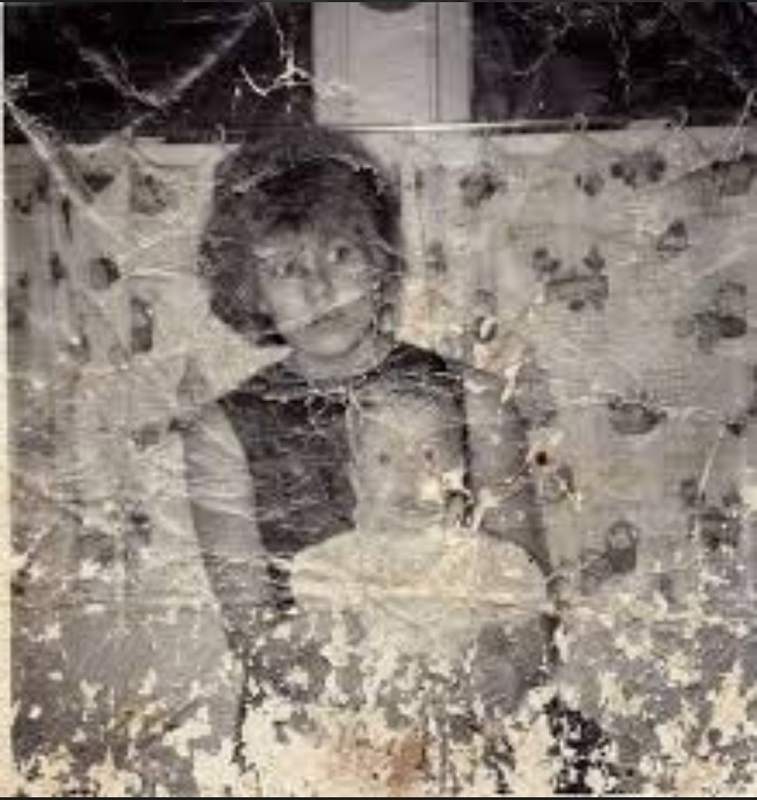 Damaged Vintage Mother and Child Photo — GPT Image 2 example by @gdb